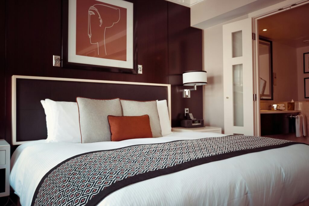 Cozy and modern bedroom interior with elegant decor and soft lighting.
